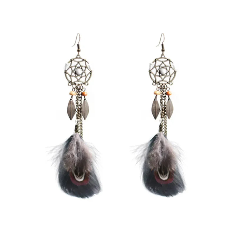 Boucles d'oreilles longues fantaisie bohèmes ethniques avec attrape-rêves, plumes, crochets antiques, chaîne et pompon, faites main, pour femme, bijou
